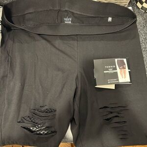 Women’s plus black ripped biker shorts